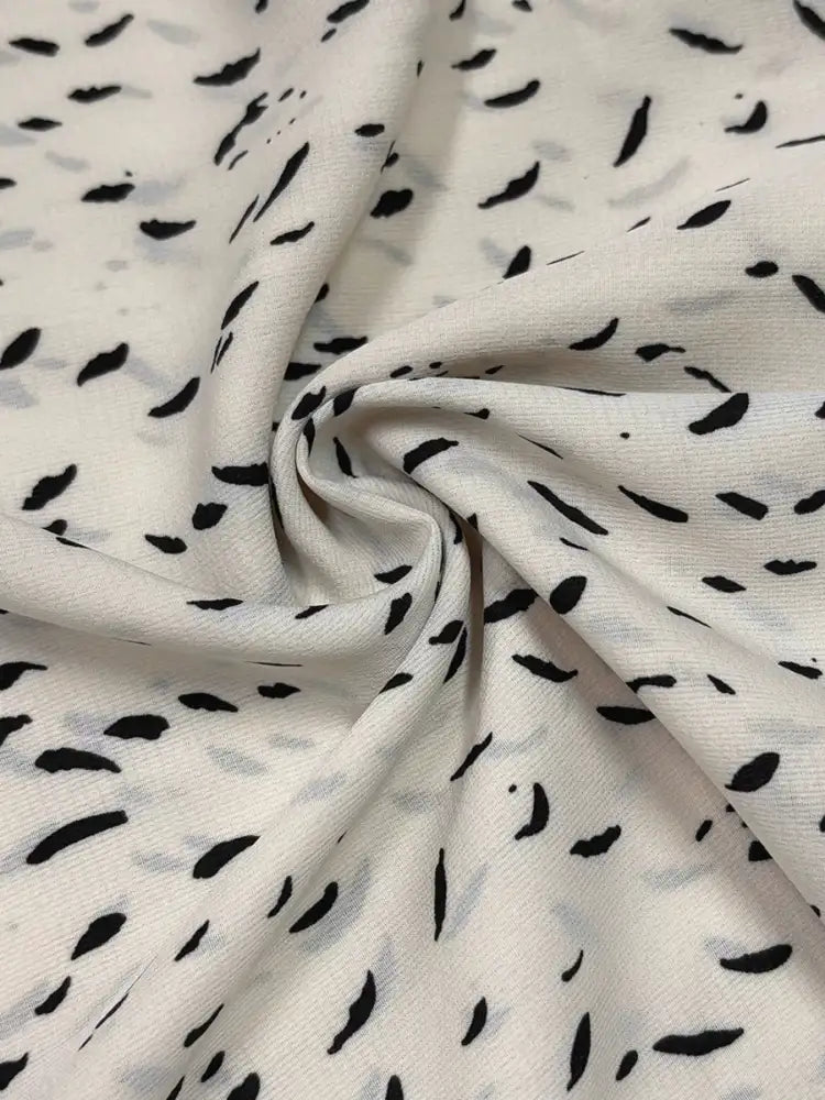 Ruffled Printed Tie Neck Long Sleeve Blouse